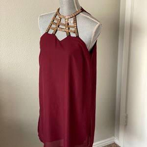 Maroon dress with golden neck
